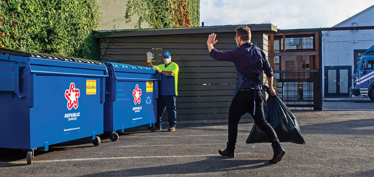 Person waving to a Republic Services employee
